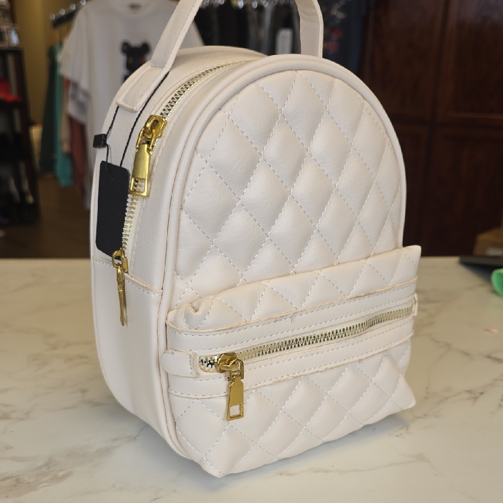 Elegant Cream Quilted Backpack